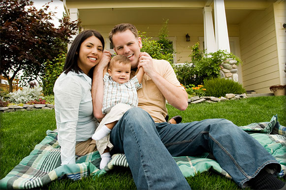 Family in front of a home